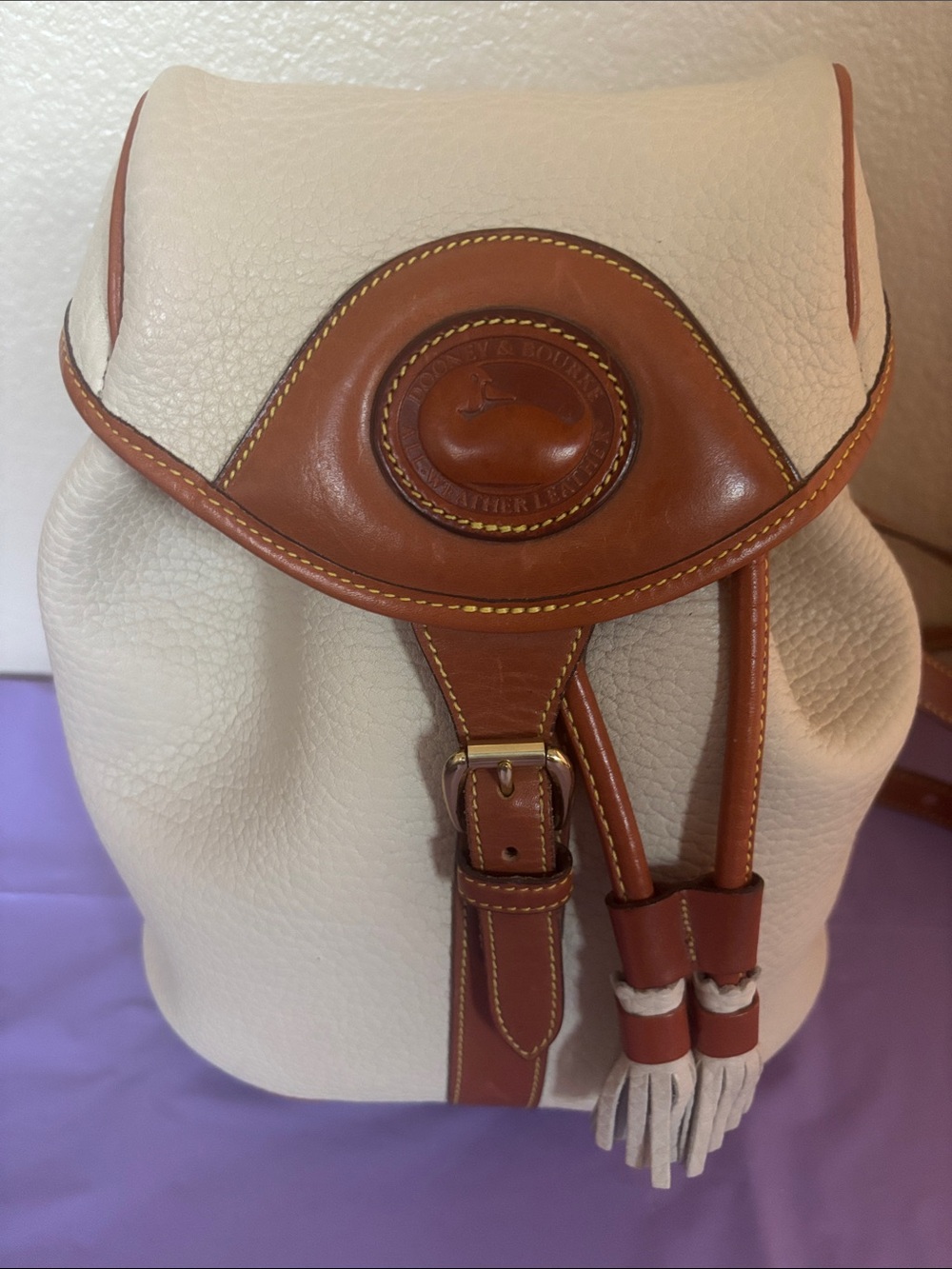 Dooney & Bourke Cream and Brown Pebbled Leather Drawstring Backpack